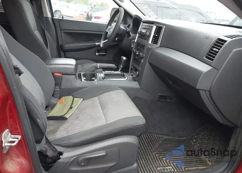 2010 Jeep Grand Cherokee Laredo z USA, uszkodzony, nr VIN 1J4PR4GK1AC120595